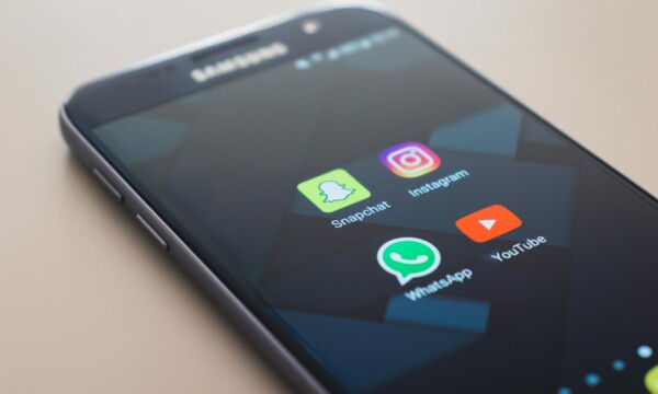 Instagram and YouTube logo on phone